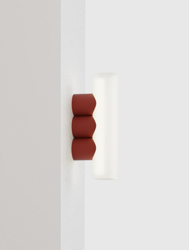 Multitude design wall lamp: a sandblasted glass diffuser supported by 3 coloured metal cylinders for an ultra-design luminaire.